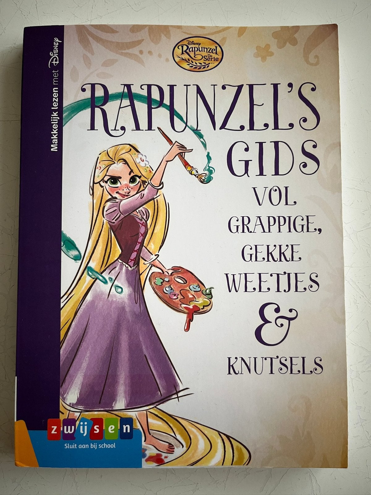 Disney Rapunzel’s gids vol grappige gekke weetjes & knutsels, Boeken, Ophalen of Verzenden, Zo goed als nieuw, Sprookjes