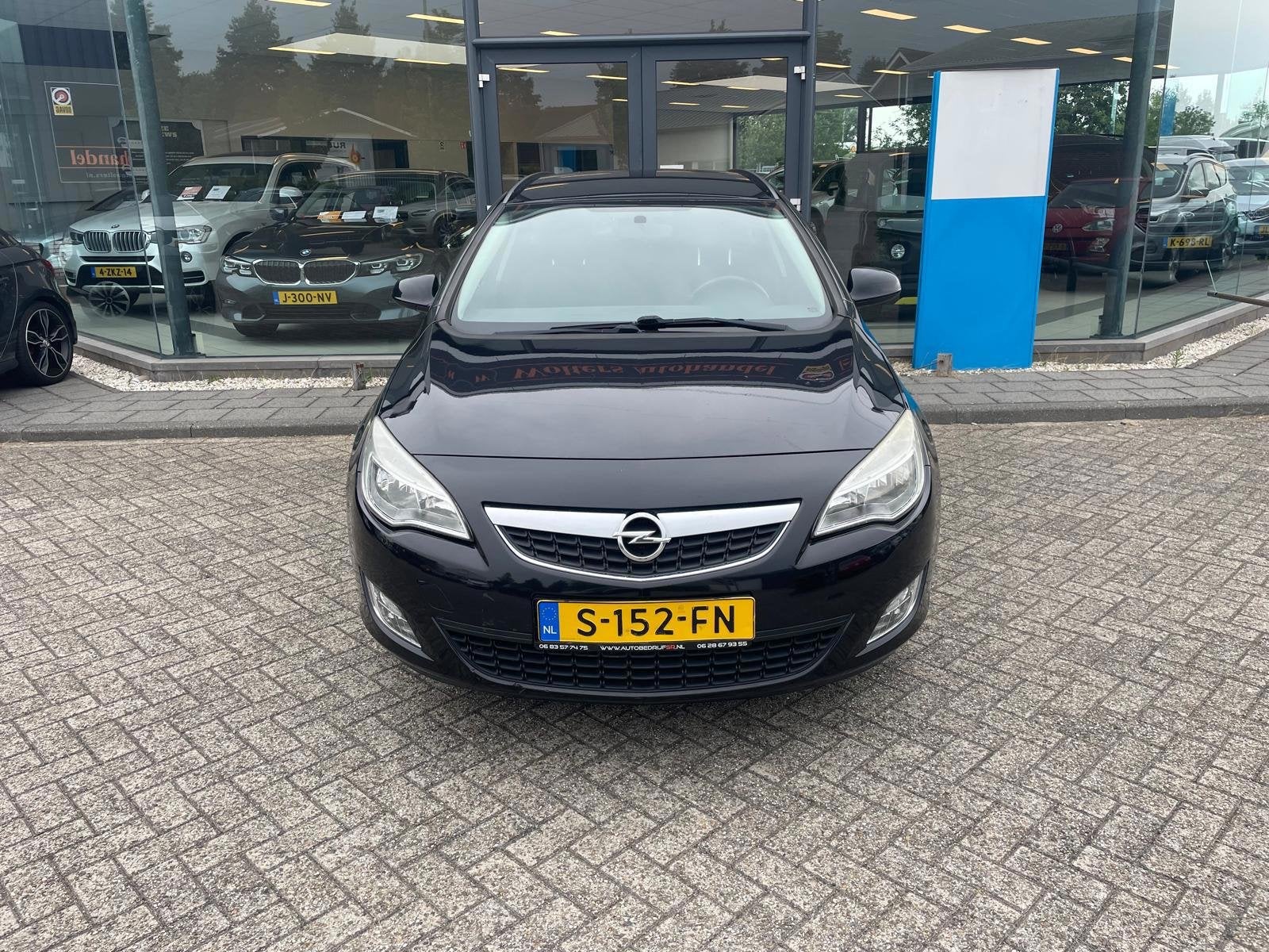 Opel Astra Sports Tourer 1.4 Turbo Cosmo, Auto's, Voorwielaandrijving, Euro 5, Stof, Gebruikt