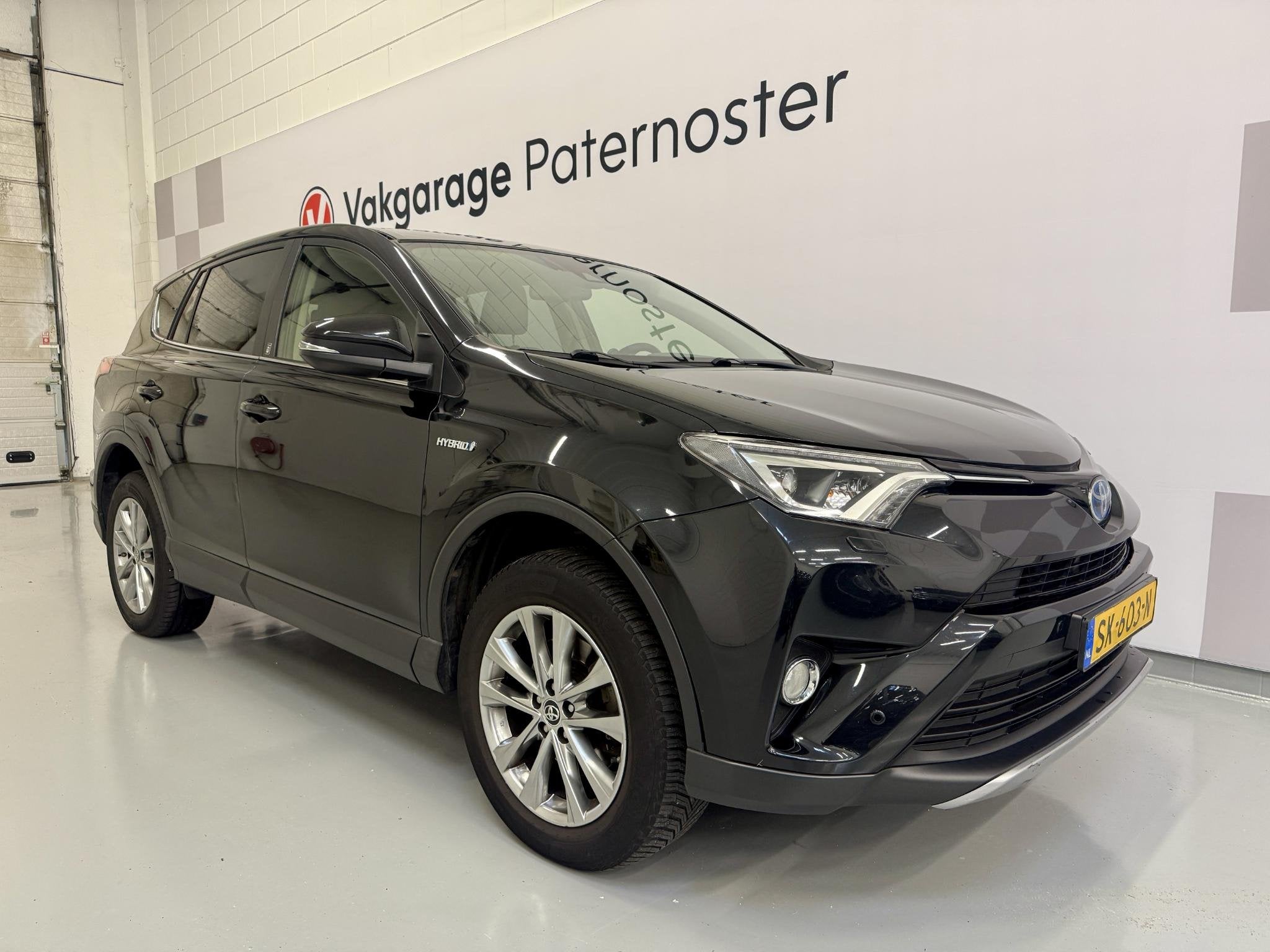 Toyota RAV4 2.5 Hybrid Dynamic Leer / PDC / Camera / Afneemb, Automatische klimaatregeling, Gebruikt, Euro 6, Zwart