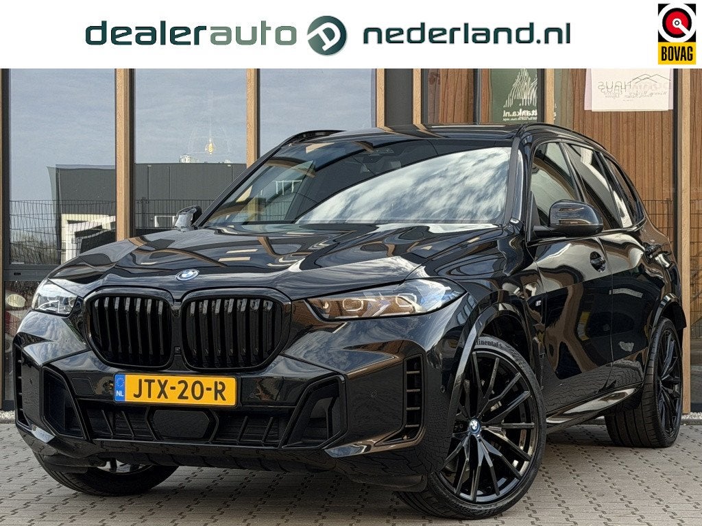 BMW X5 xDrive 50e M-Sport | Panoramadak |Driving Assistant |, Dealer onderhouden, Gebruikt, 2395 kg, Zwart