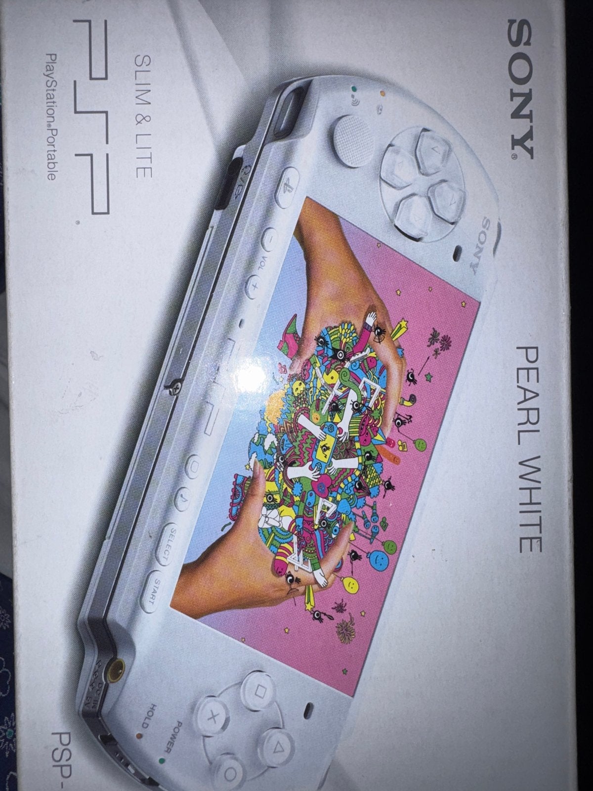 PSP Slim & Lite Pearl White met 3 spellen, Gebruikt, 1 speler, Ophalen of Verzenden, Vanaf 3 jaar