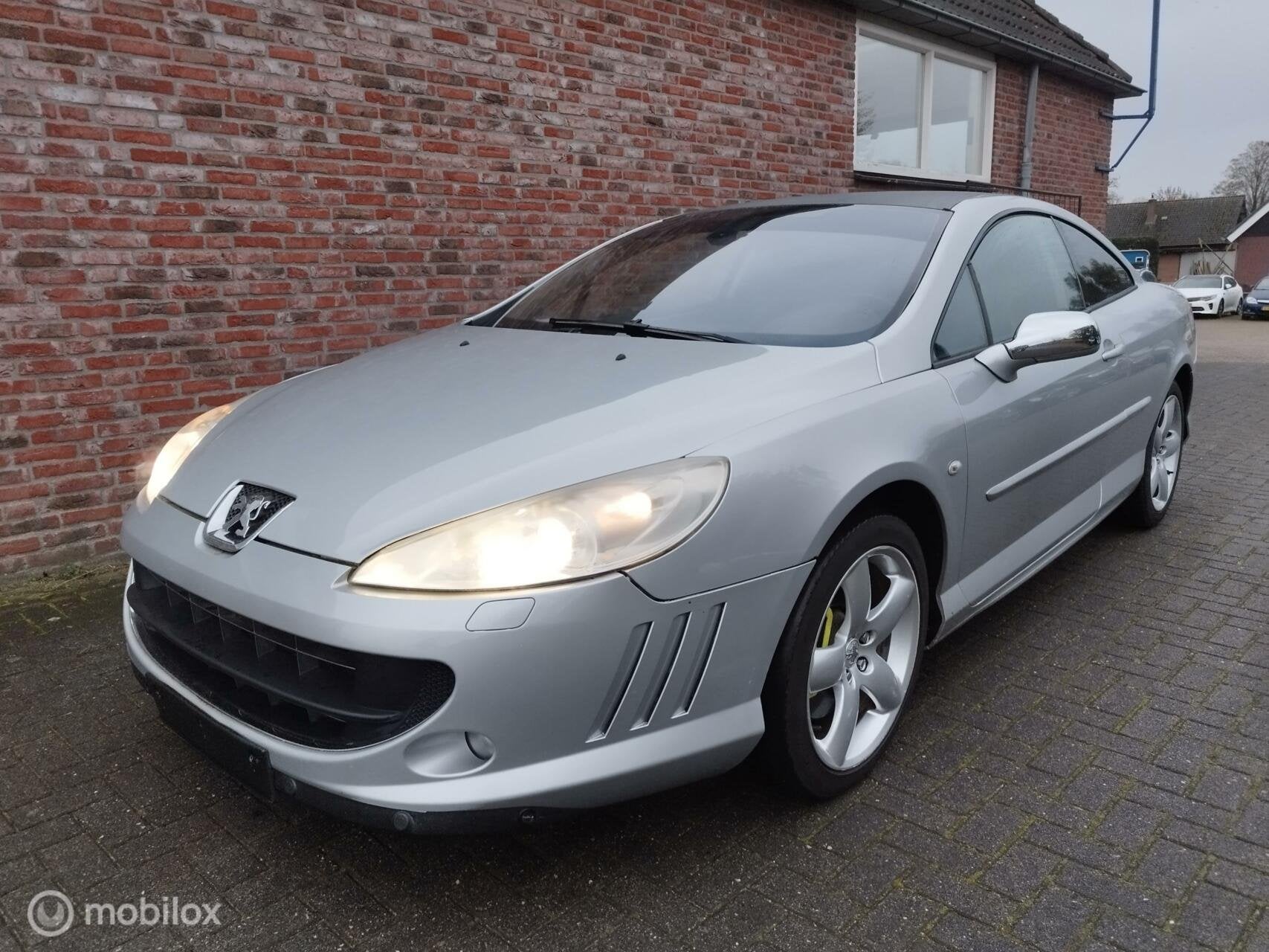 Peugeot 407 Coupé 2.7 HDiF Féline, Auto's, Peugeot, Automatische klimaatregeling, Gebruikt, 197 €/maand, 4 stoelen