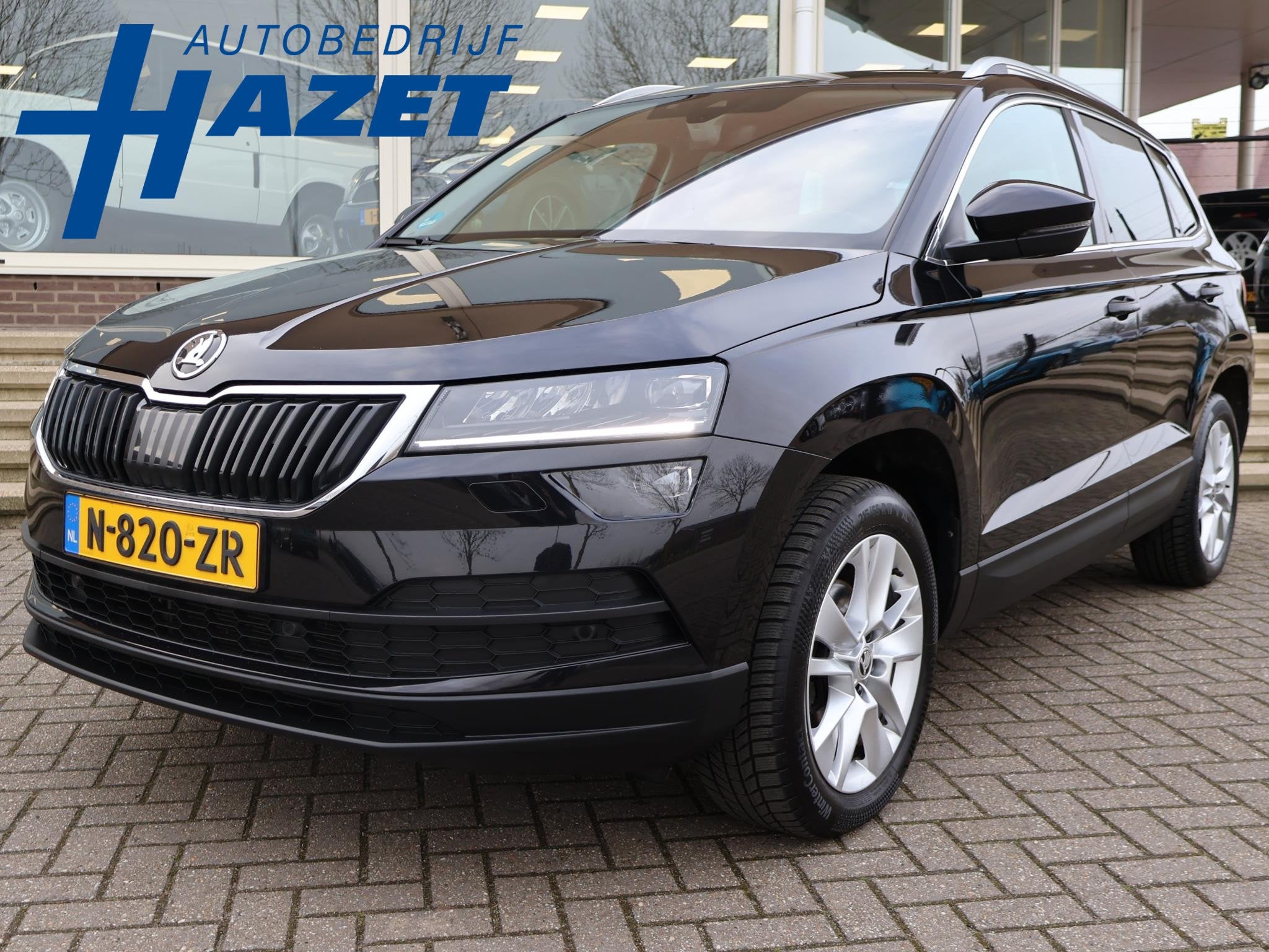 Skoda Karoq 1.5 TSI ACT 150 PK AUT. + WEGKL. TREKHAAK | CANT, Stof, 4 cilinders, Zwart, 19 km/l