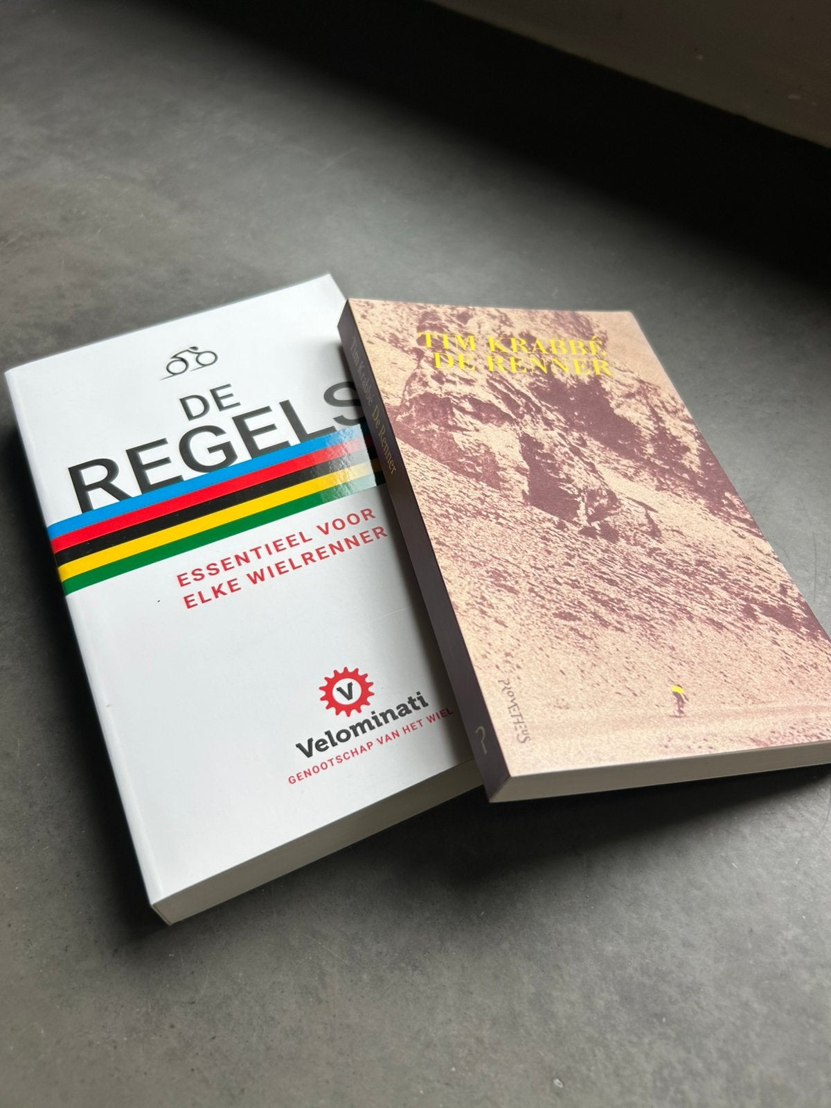 Set van 2 boeken voor de wielrenner : De Renner en De Regels, Ophalen, Zo goed als nieuw, Lopen en Fietsen
