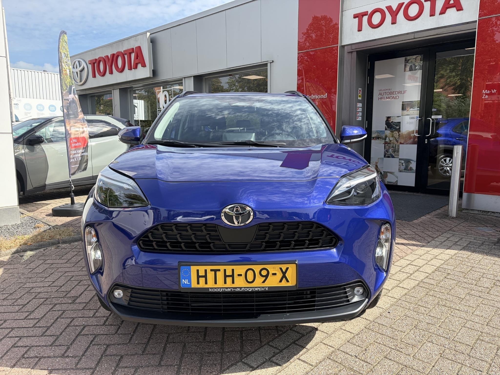 Toyota Yaris Cross 1.5 Hybrid 115 Active, Auto's, Stof, Gebruikt, 1165 kg, Blauw