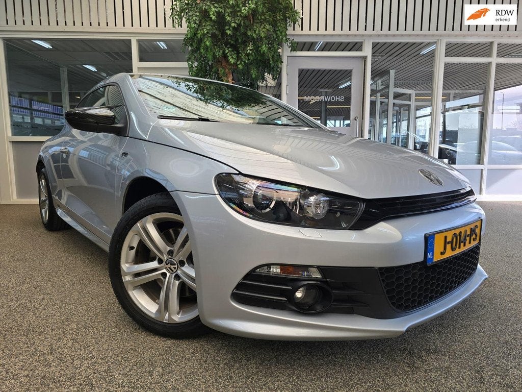 Volkswagen Scirocco 1.4 TSI R-Line Dsg Xenon, Auto's, Volkswagen, Euro 5, Automatische klimaatregeling, Gebruikt, Zwart