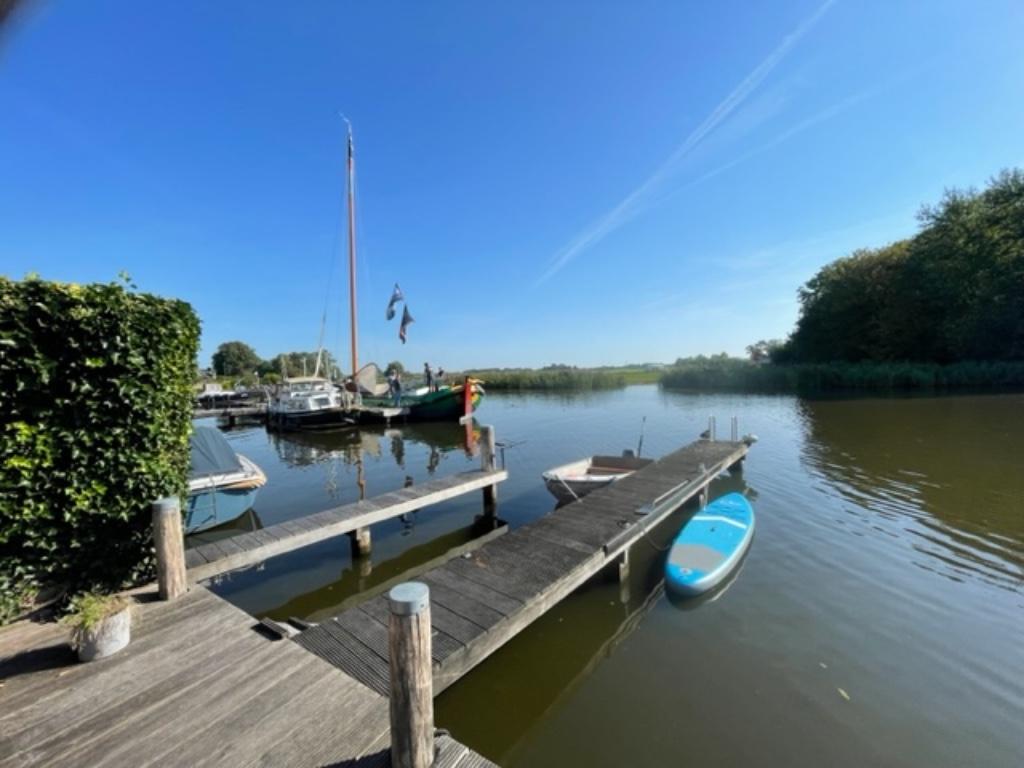 Vakantiehuis aan vaarwater, 6 pers. te huur Friesland, Vakantie, Vakantiehuizen | Nederland, Dorp, Overige typen, Open haard, Friesland
