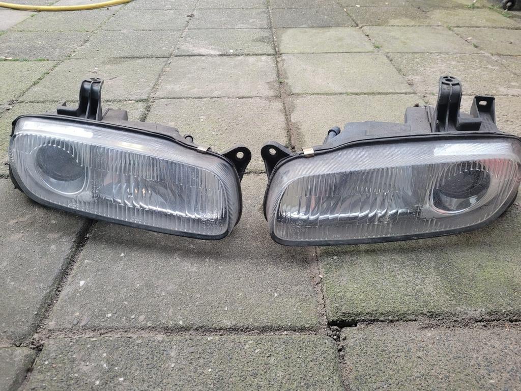 Koplampen voor Mazda 323 F, Ophalen of Verzenden