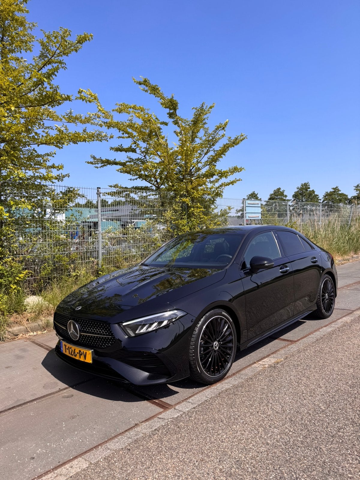 Mercedes-Benz A-Klasse A 180 136pk 7G-DCT  2023 Zwart AMG L, Auto's, Mercedes-Benz, 136 pk, Lichtsensor, Zwart, Origineel Nederlands