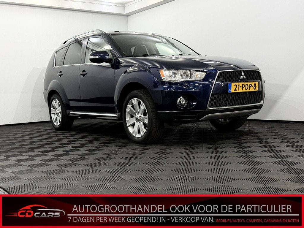 Mitsubishi Outlander 2.4 Instyle 7P Schuifdak, Leder, Navi,, Auto's, Mitsubishi, Automaat, 4 cilinders, Blauw, 7 stoelen