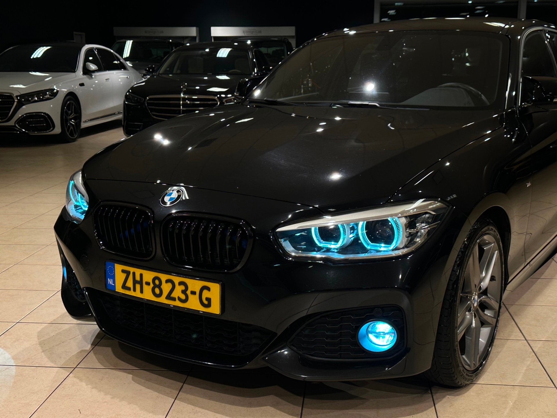 BMW 1-serie 118i High Executive/M-Sport/Leder/Automaat/Top, Gebruikt, Zwart, Bedrijf, 650 kg