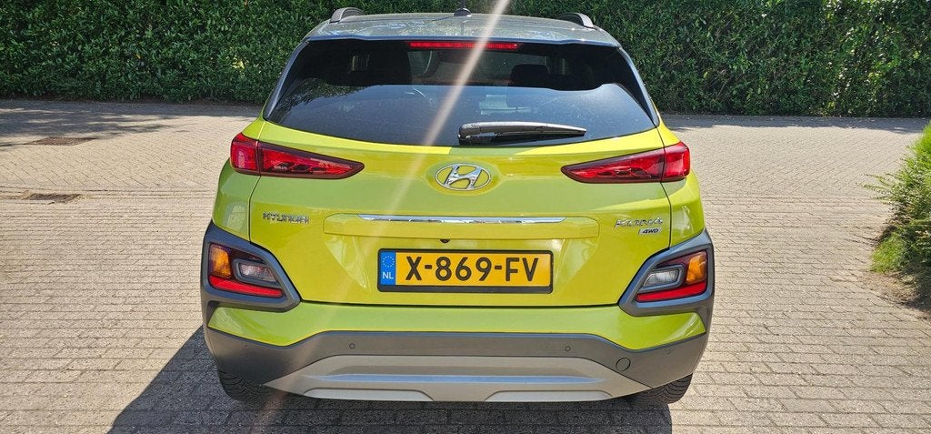 Hyundai Kona 1.6 T-GDI 4WD Premium, Automaat, 15 km/l, 4 cilinders, Leder en Stof