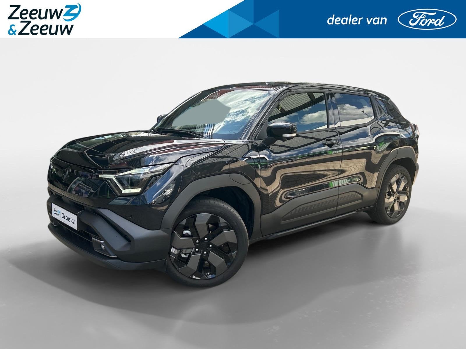 Suzuki e VITARA Style 61 kWh | Apple Carplay/Android Auto |, Auto's, 12 maanden, Verwarmde buitenspiegels, Leder en Stof, Zwart