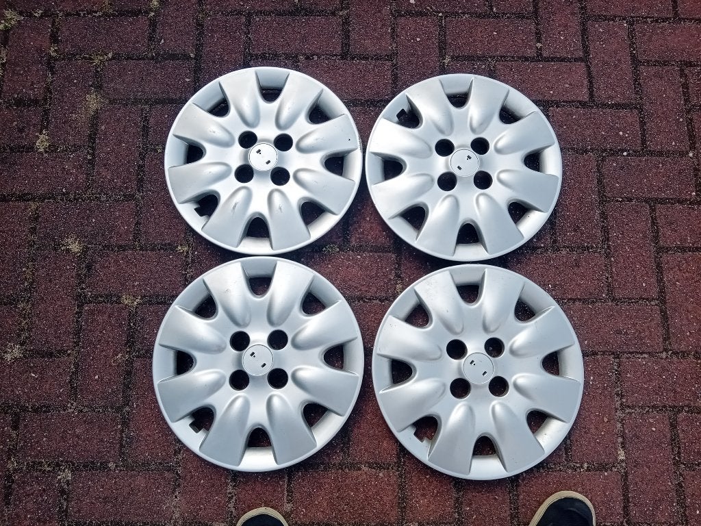 Nissan 14 inch wieldoppen, Auto diversen, Wieldoppen, Ophalen of Verzenden, Gebruikt