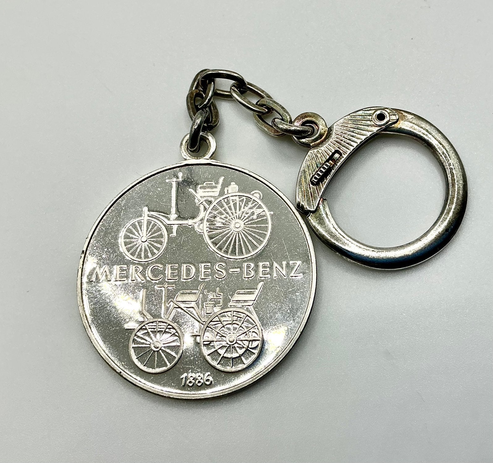 Vintage Mercedes-Benz sleutelhanger 1886 echt zilver Daimler, Verzenden, Zo goed als nieuw, Merk