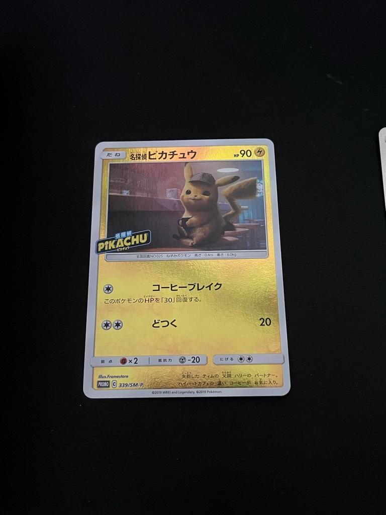 Detective Pikachu SM-P 339 Pokemon Kaart NN, Ophalen of Verzenden, Zo goed als nieuw, Losse kaart, Foil