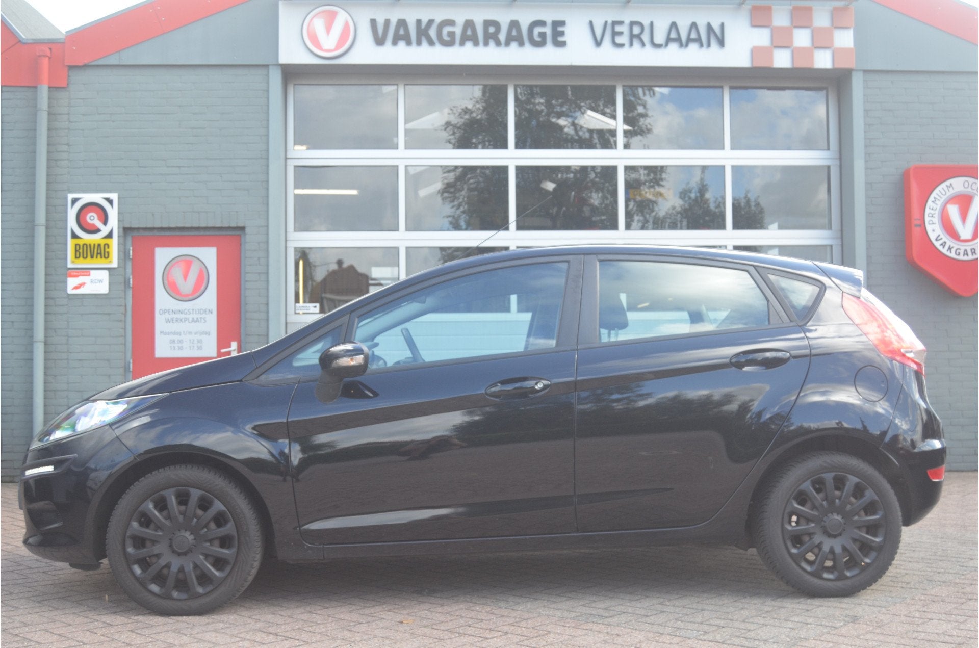 Ford Fiesta 1.25 luxe...12 mnd. gar.... (bj 2010), Voorwielaandrijving, 1242 cc, Zwart, Bedrijf