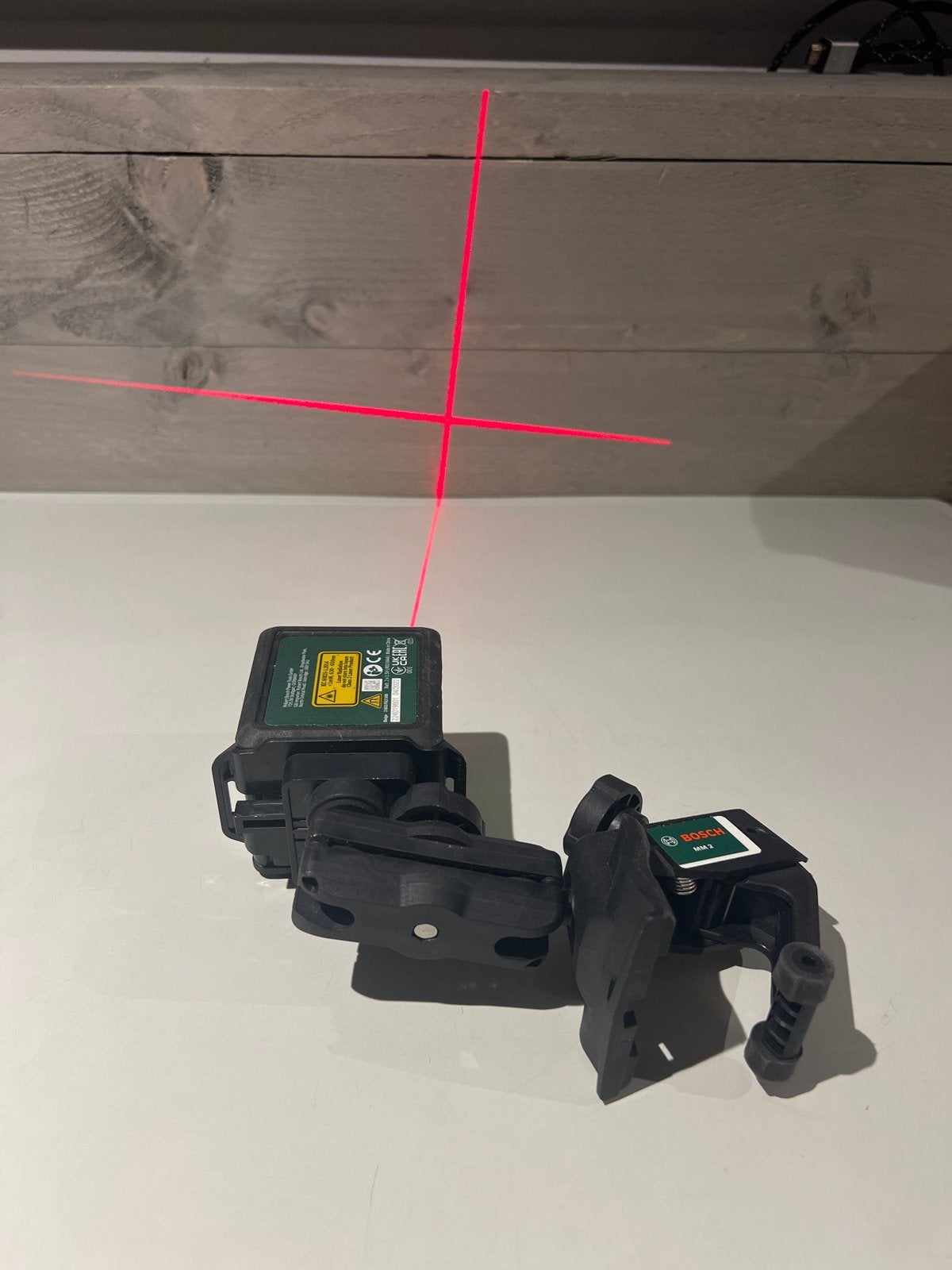 Bosch Quigo Kruislijnlaser met houder - Zo goed als nieuw, Doe-het-zelf en Verbouw, Meetapparatuur, N, N, Nieuw, Ophalen of Verzenden