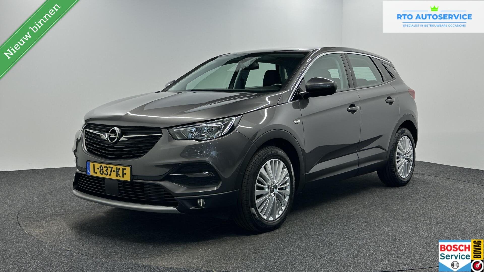 Opel Grandland X 1.2 Turbo Innovationn TREKHAAK CAMERA CARPL, Auto's, Gebruikt, 1199 cc, Met garantie (alle), Leder en Stof