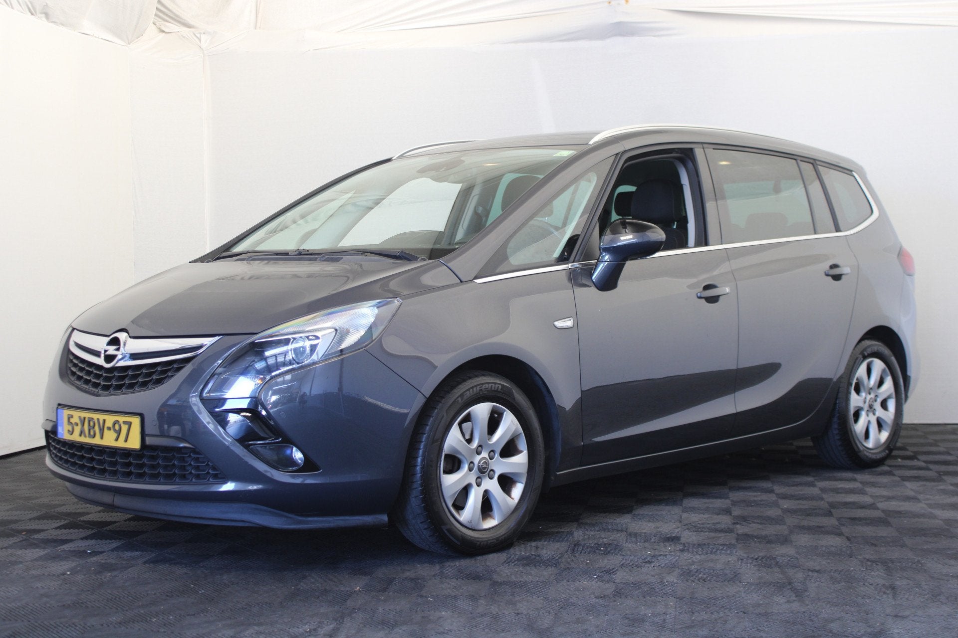 Opel Zafira Tourer 1.4 Business+ 7p. (bj 2014), Auto's, Stof, Gebruikt, Zwart, 4 cilinders