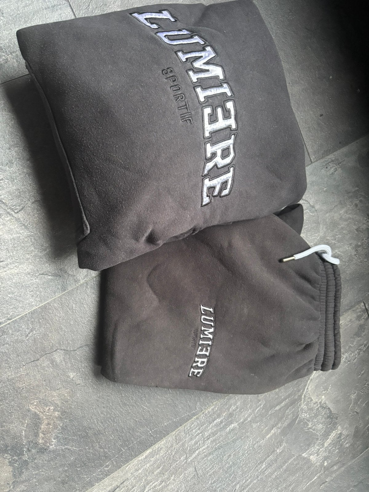 Te koop lumiere  zwart jogging pak maat xl, Ophalen of Verzenden, Zo goed als nieuw, Maat 56/58 (XL)