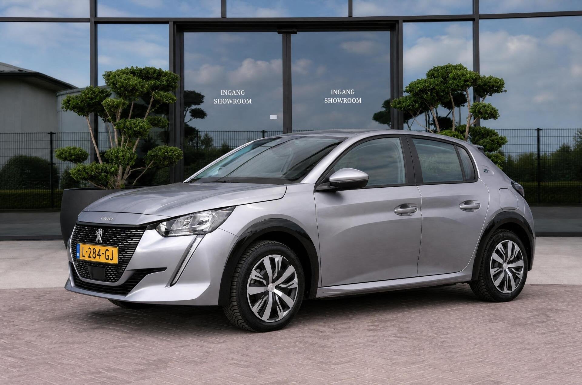 Peugeot e-208 EV Active Pack 50 kWh | SOH 88,69 %, Auto's, Gebruikt, Automatische klimaatregeling, Origineel Nederlands, Grijs