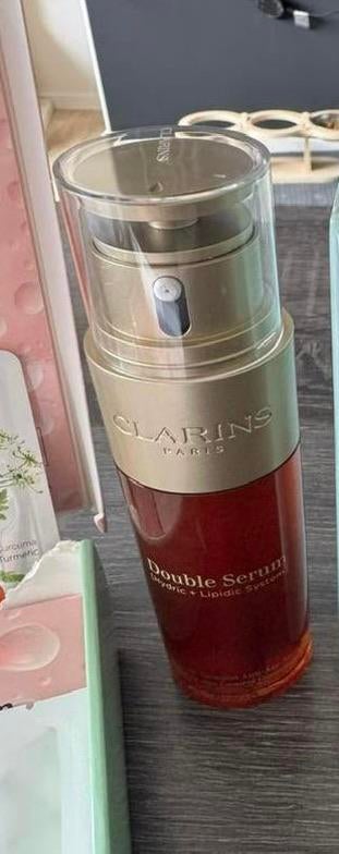clarins double serum nieuw bijna gratis, Ophalen of Verzenden, Nieuw, Gehele gezicht, Verzorging