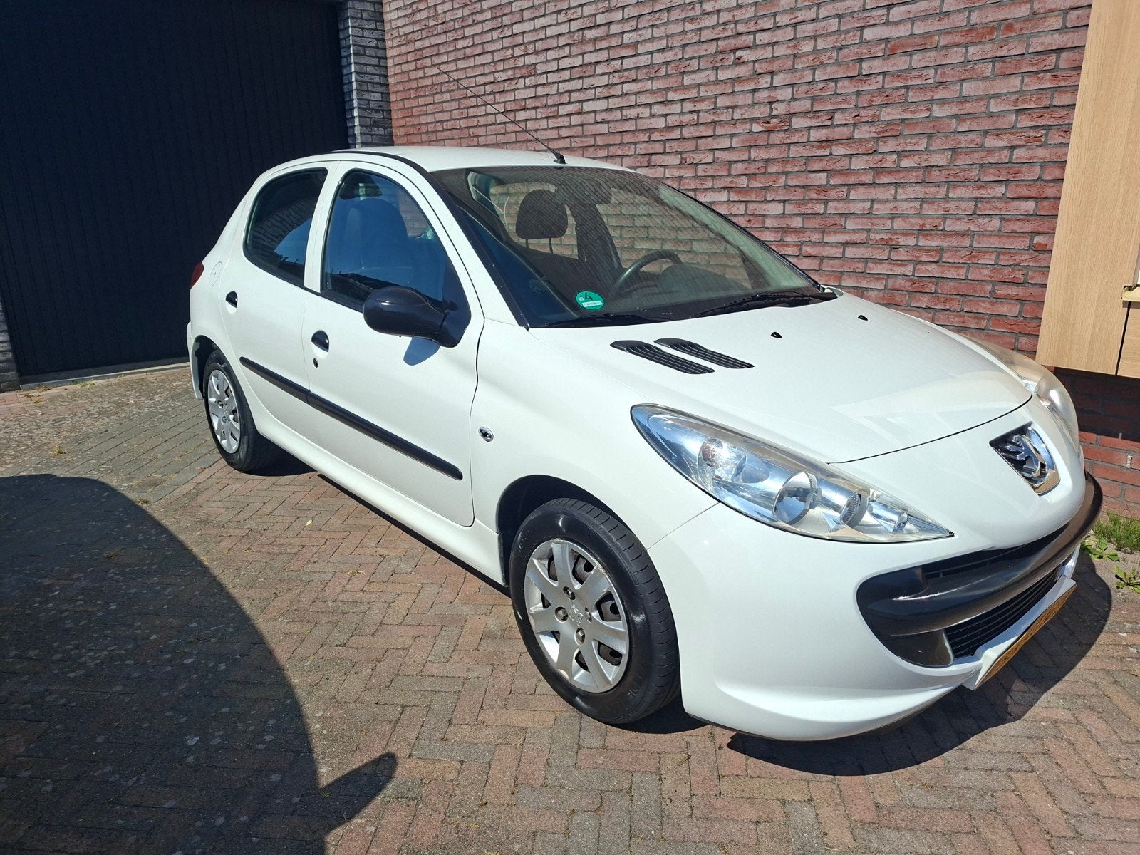 Peugeot 206+ 1.1 5D 2009 Wit, Auto's, Peugeot, Voorwielaandrijving, 206+, Wit, Origineel Nederlands
