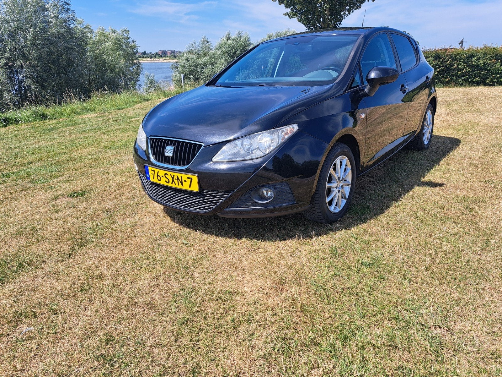 Seat Ibiza 1.4 63KW 2012 Zwart 5 deurs 101870 km nl auto, Voorwielaandrijving, Stof, 40 €/maand, Zwart
