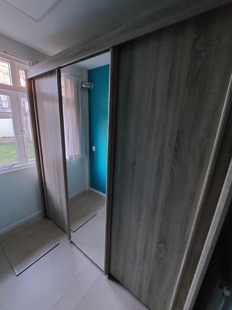 Kledingkast met spiegel, 2 hang-gedeeltes en 6 lades, 200 cm of meer, Zo goed als nieuw, 200 cm of meer, 25 tot 50 cm