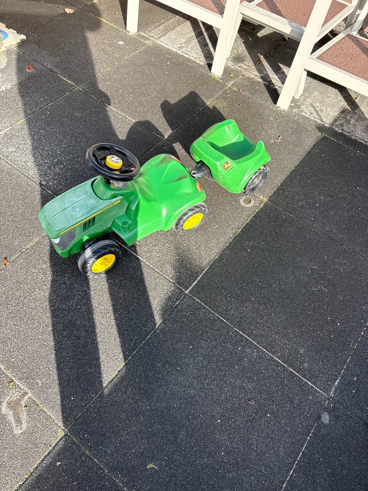 John Deere traptractor met aanhanger, Ophalen