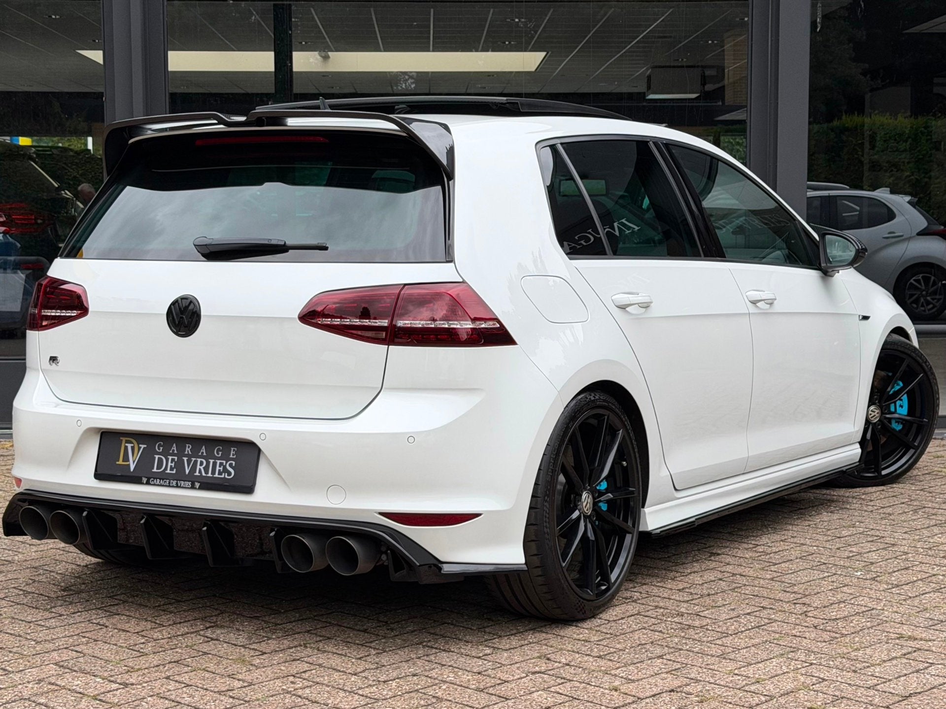 Volkswagen Golf 2.0 TSI R 4Motion DSG Milltek 410pk Panorama, Automaat, Gebruikt, Zwart, 4 cilinders