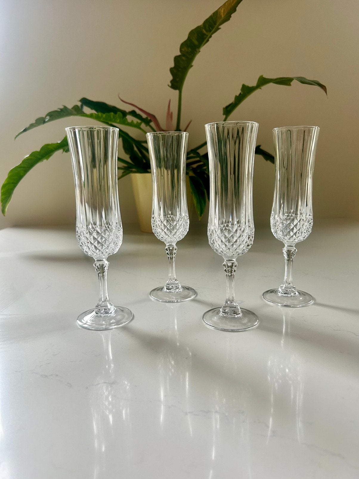 4 vintage kristallen flutes. Cristal d arques Longchamp, Verzamelen, Ophalen of Verzenden, Zo goed als nieuw, Overige typen