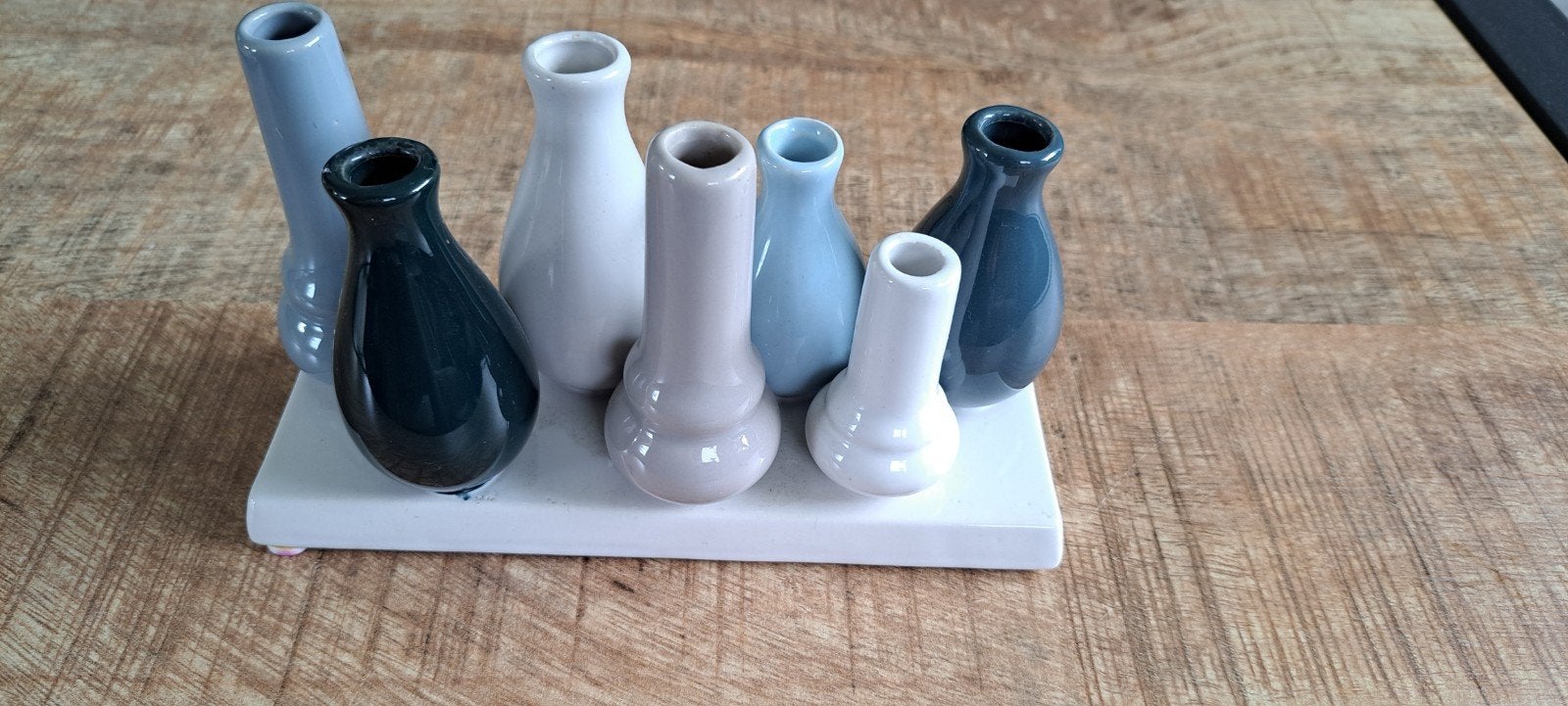 7 kleine vaasjes vast op onder plaatje, Huis en Inrichting, Ophalen, Gebruikt, Steen/keramiek