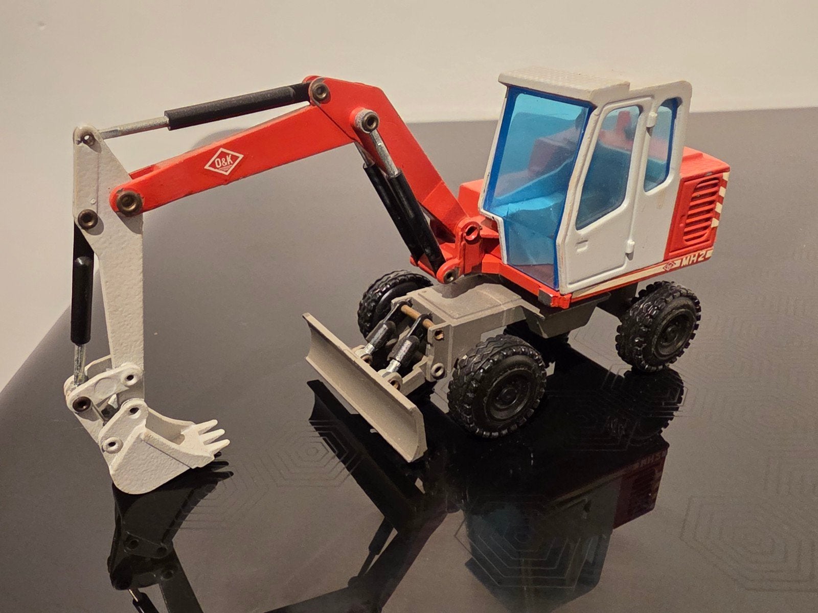 O&K MH2 1:50 NZG Graafmachine, Ophalen of Verzenden, Zo goed als nieuw, Hijskraan, Tractor of Landbouw, NZG