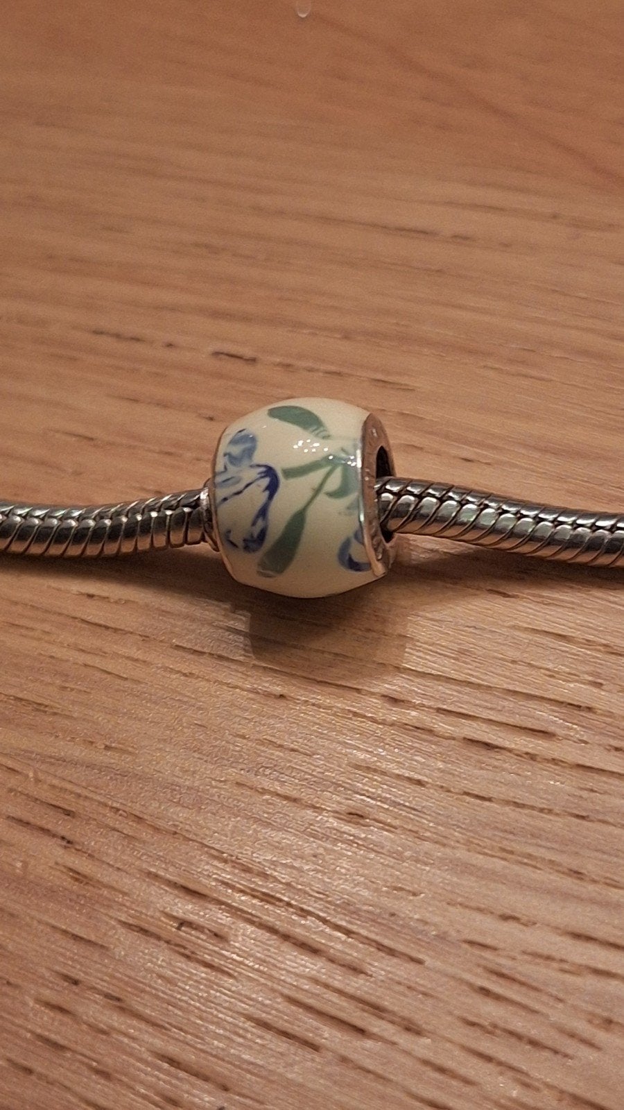 Bacio bedel met zilveren kern voor armband of ketting, Ophalen of Verzenden, Zo goed als nieuw, Zilver, Trollbeads