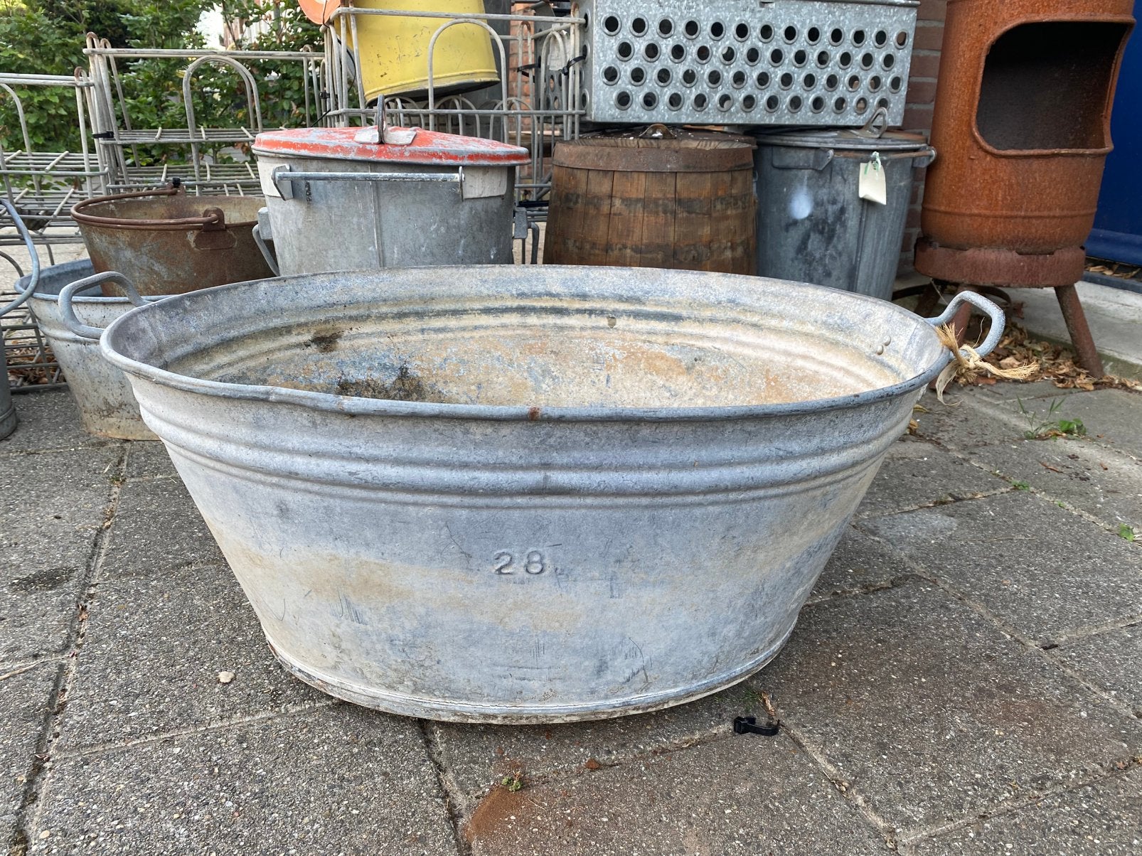 Grote zinken wasteil, Ophalen