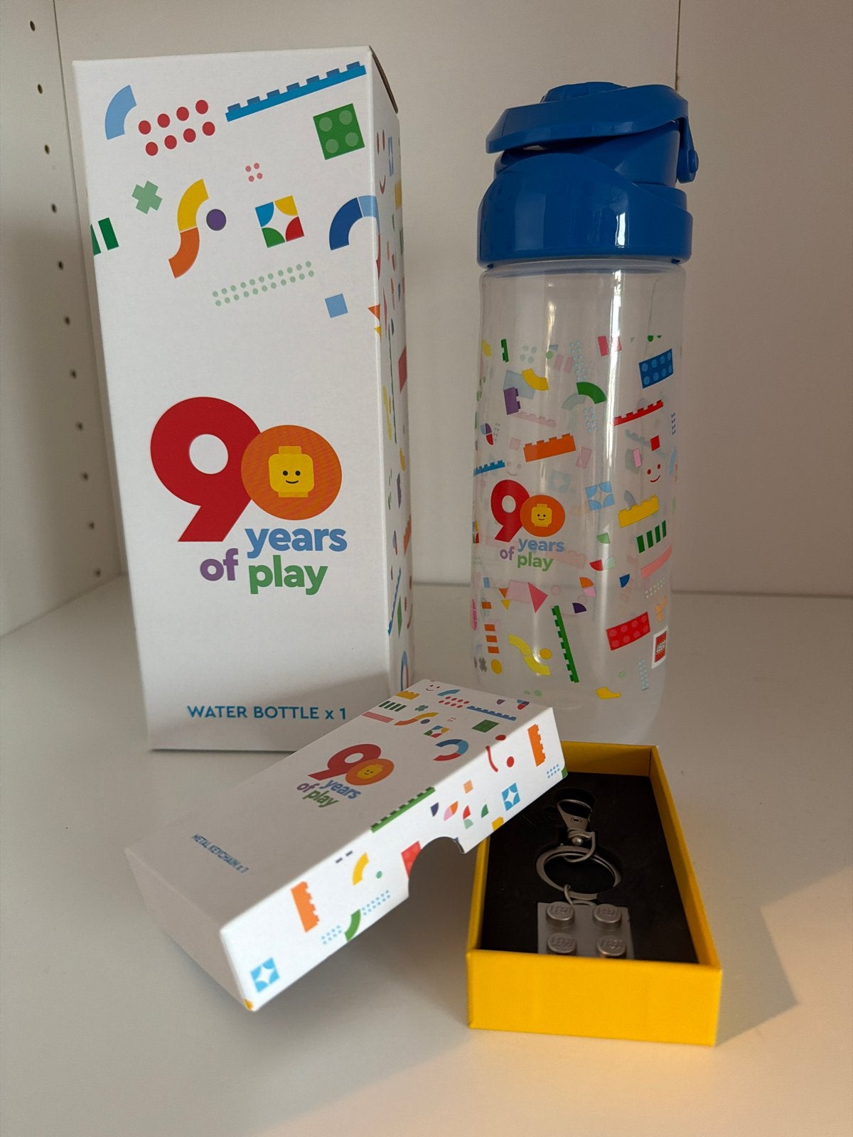 Lego 90 jaar waterfles en sleutelhanger, Ophalen of Verzenden, Nieuw, Jongen of Meisje