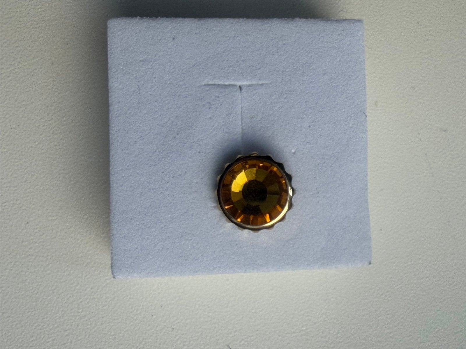 Melano Vivid Steentje - Geel/Goudkleurig, Overige merken, Glas of Kristal, Ophalen of Verzenden, Zo goed als nieuw