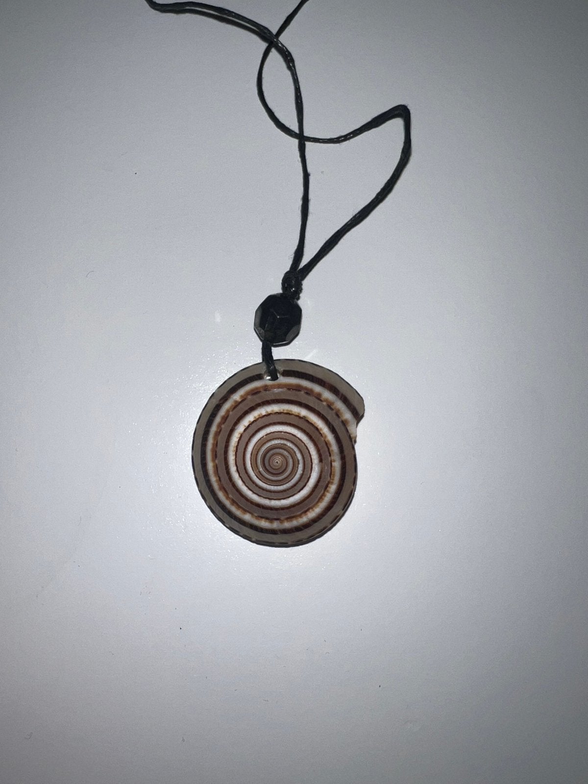 Sonnenuhr schnecke hanger, Overige materialen, Bruin, Ophalen of Verzenden, Zo goed als nieuw