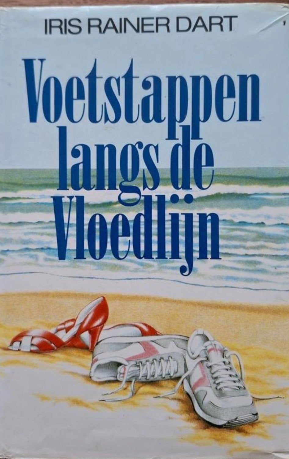 Voetstappen langs de vloedlijn van Iris Rainer Dart. Een rom, Ophalen of Verzenden, Zo goed als nieuw