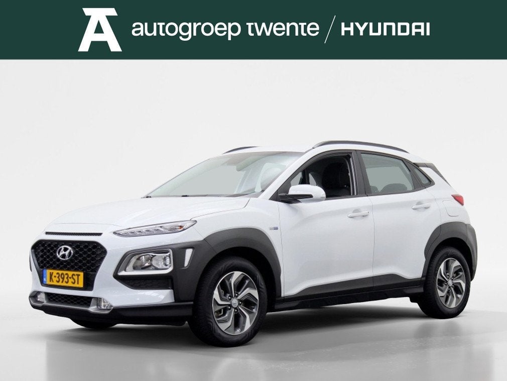 Hyundai KONA 1.6 GDI HEV Comfort | Carplay - Android Auto |, Auto's, Stof, Gebruikt, Wit, 26 km/l
