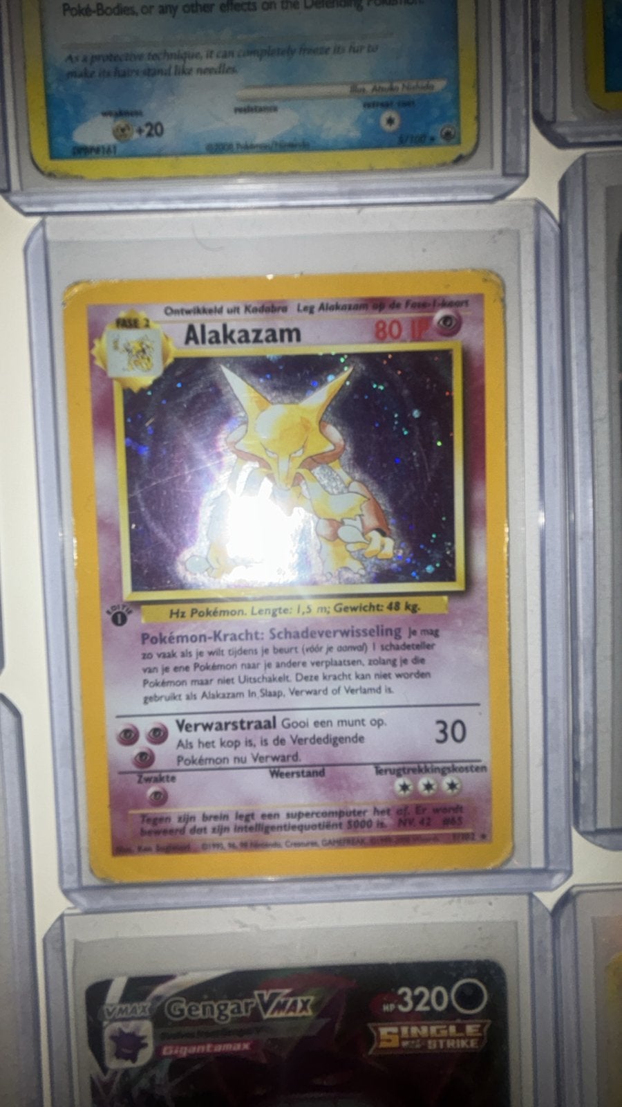 Alakazam Pokémon kaart 1st editie holo nederlands, Ophalen of Verzenden, Zo goed als nieuw, Losse kaart, Foil