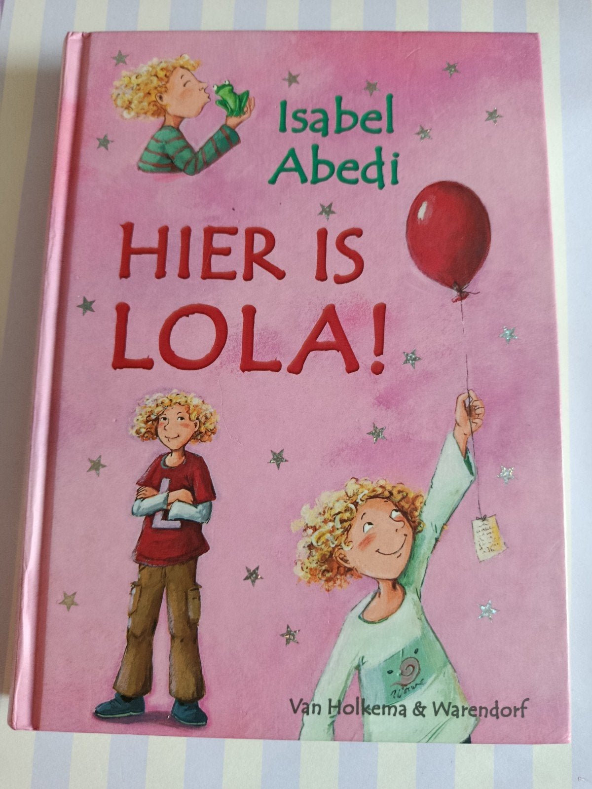 Hier is Lola, Ophalen of Verzenden, Zo goed als nieuw