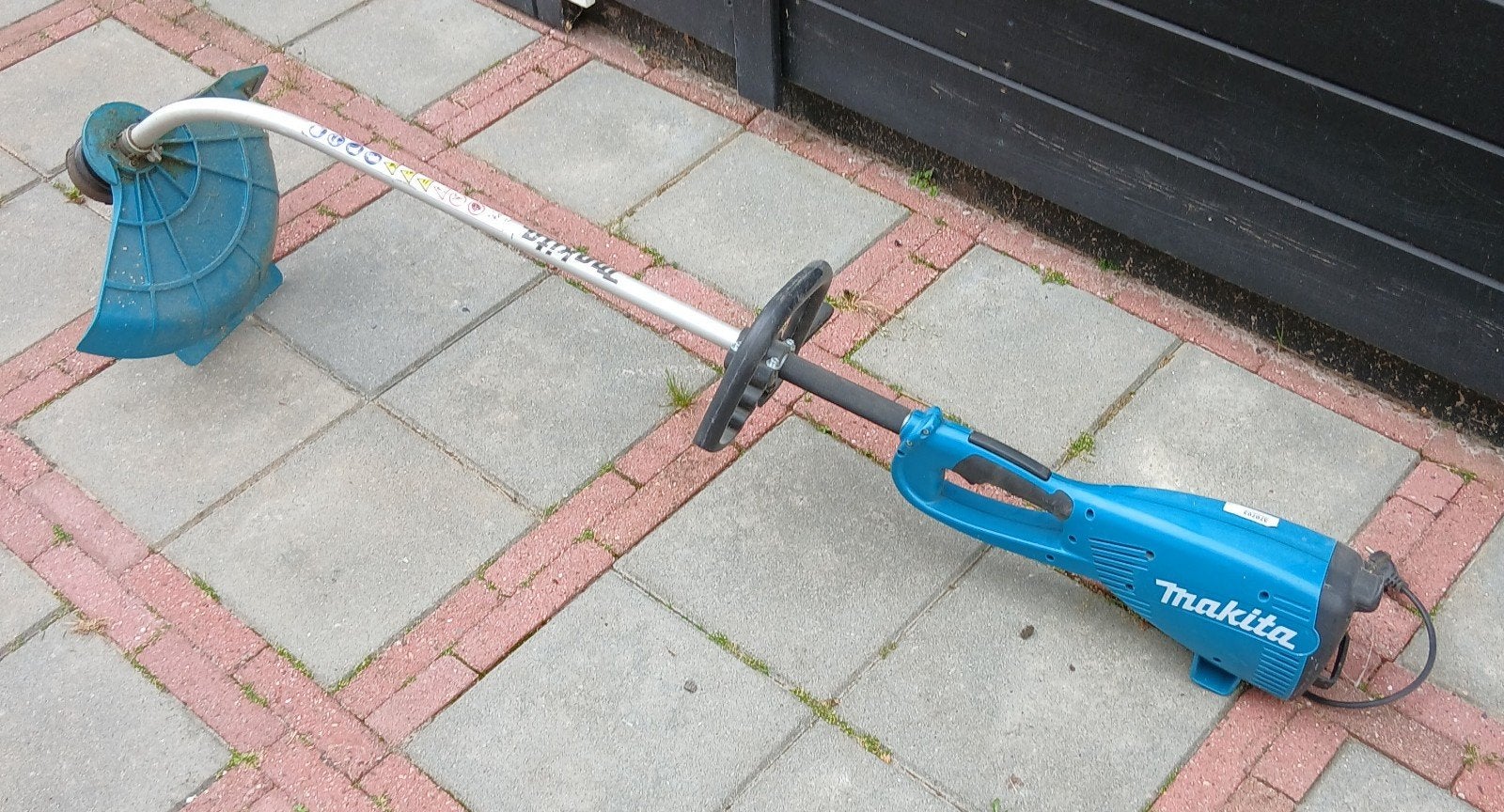Makita trimmer um4030, Tuin en Terras, Ophalen, Zo goed als nieuw, Elektrisch, Makita UM4030