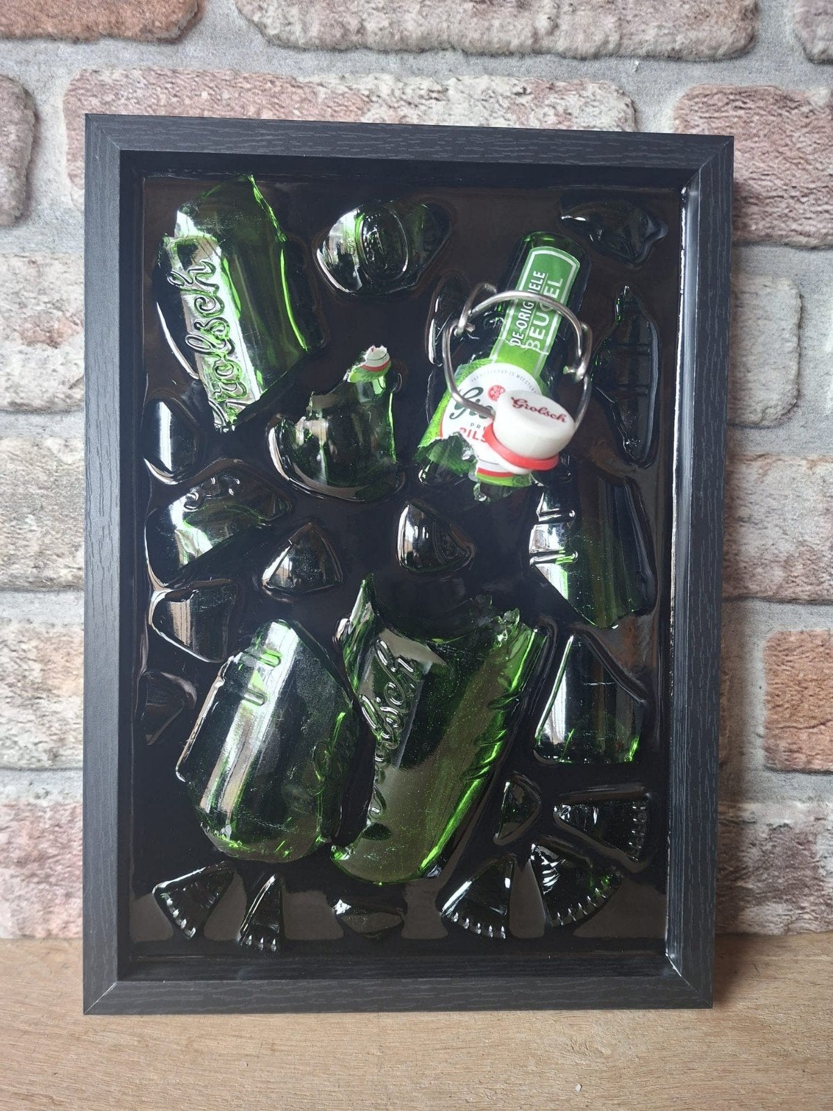 Grolsch beugelfles verwerkt in een lijst 23x33 met Epoxy, Ophalen of Verzenden