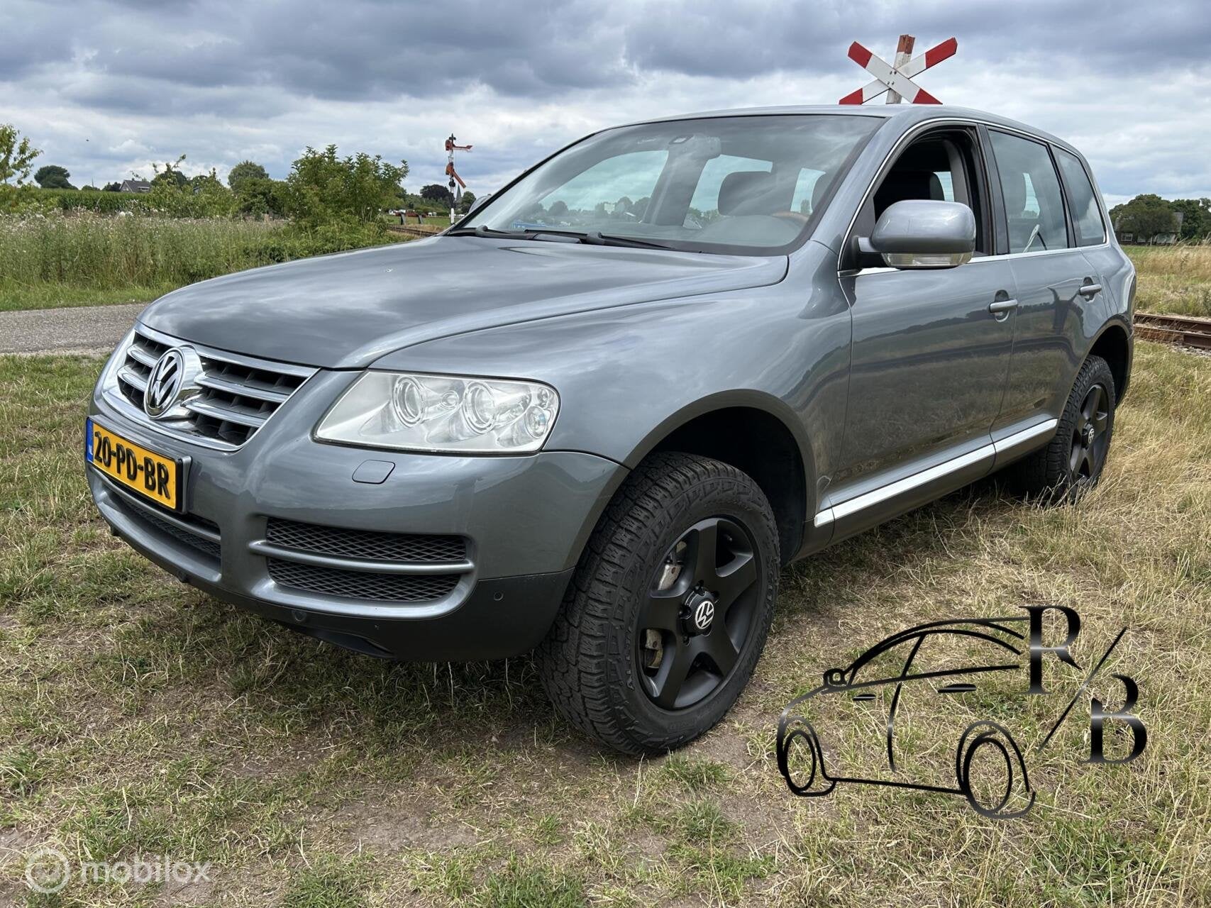 Volkswagen Touareg 3.2 V6 AUT. LEER NAVI PARK SENS. LEES TEK, Auto's, Automaat, Gebruikt, Zwart, 3189 cc