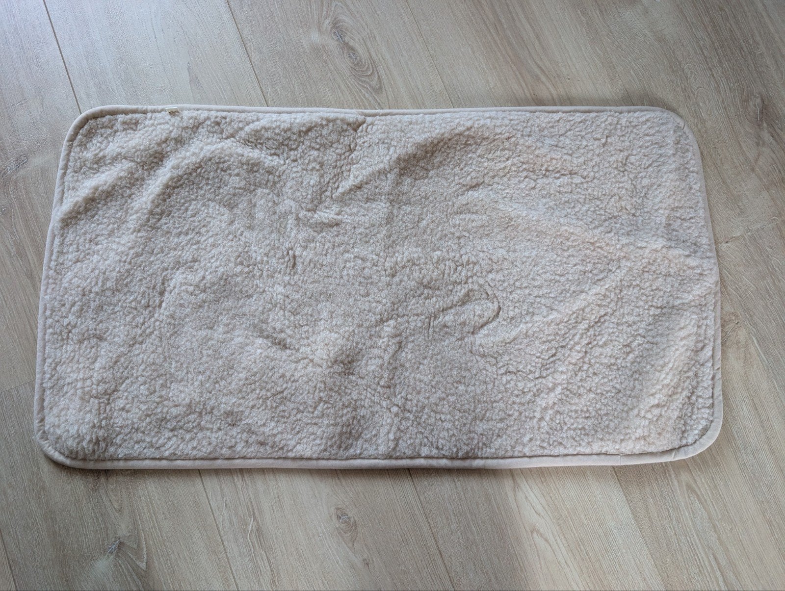 Wollen onderlegger Kico voor co-sleeper/wieg/kinderwagen