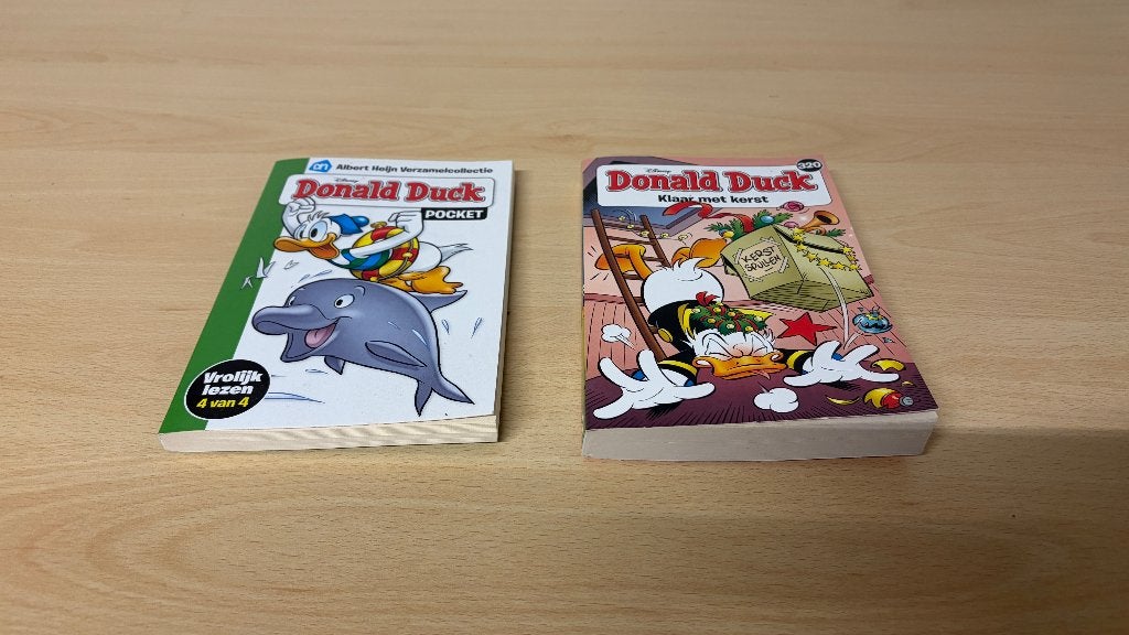 2x Donald Duck pocketboekje, Meerdere stripboeken, Ophalen, Zo goed als nieuw