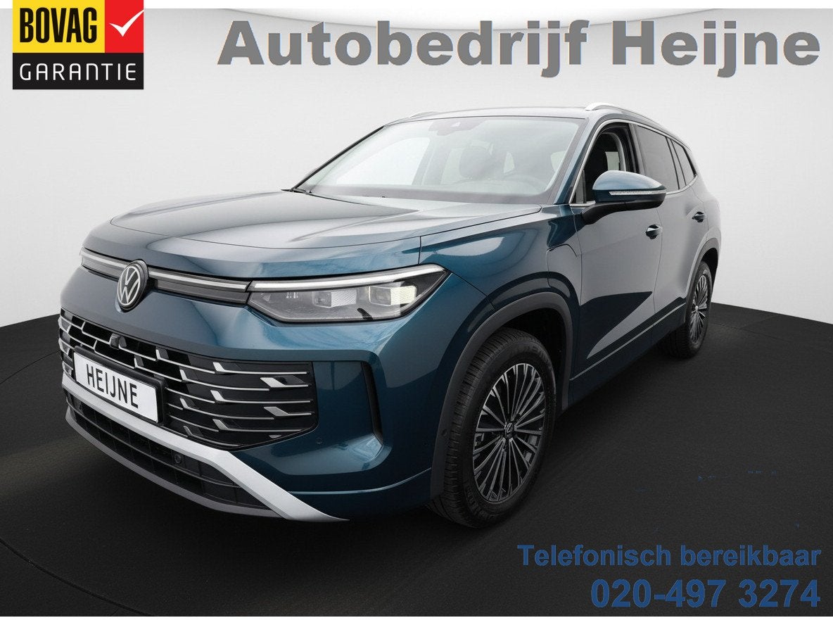Volkswagen Tayron 1.5 TSI eHybrid 204PK DSG HYBRID ELEGANCE, Auto's, Zwart, 4 cilinders, Blauw, Bedrijf